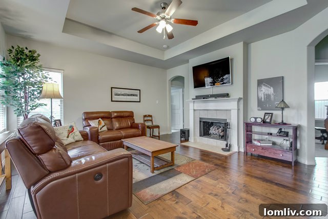 Inviting family room with wood floors and gas fireplace - 3923 Lafayette Avenue