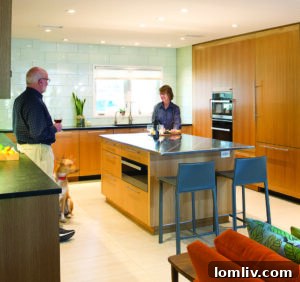 John and Leslie Enlow's modernized 1950s bungalow in Fort Worth, Texas, designed by architect Norman Ward, featuring a bright, open living space.