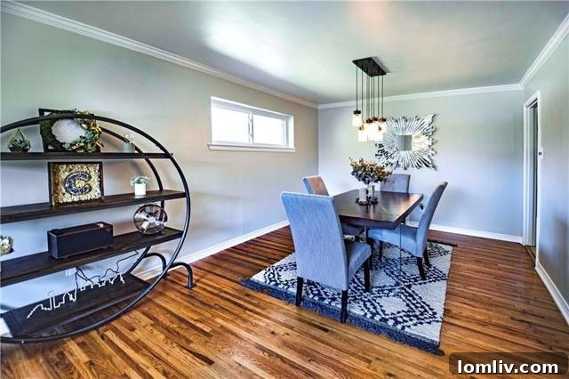 Modern kitchen with granite counters and center island cooktop