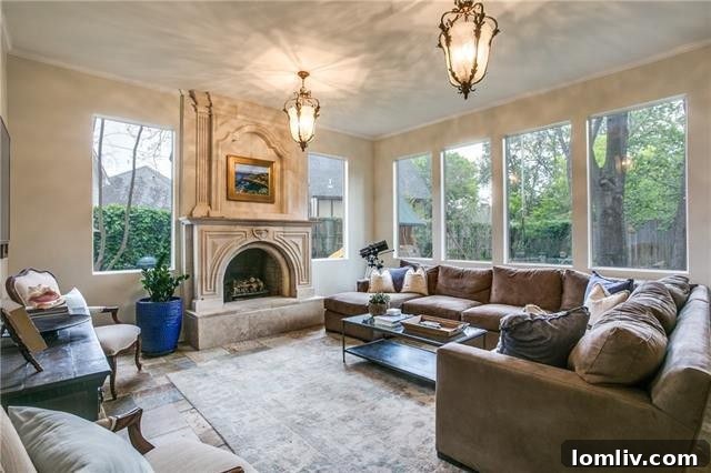 Renovated kitchen with island and granite countertops in Lakewood property