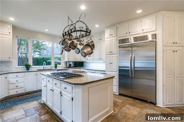 Luxurious master bathroom with jetted tub and marble floors