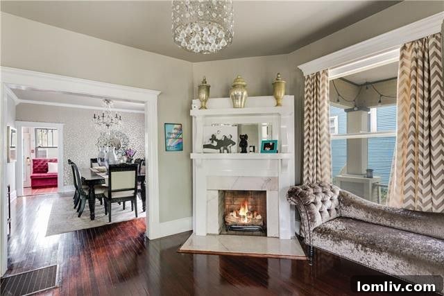 Inviting wrap-around front porch of a historic Dallas Foursquare