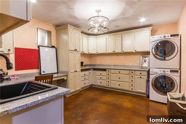 Dallas Getaway: Bespoke Barndominium Estate on 10 Secluded Acres 14 Spacious Craft and Utility Room with Built-in Desk