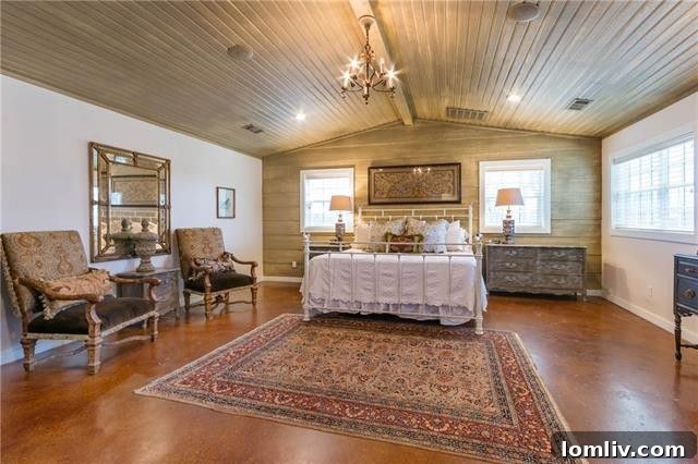 Dallas Getaway: Bespoke Barndominium Estate on 10 Secluded Acres 16 Elegant Master Bedroom with Shiplap Vaulted Ceiling