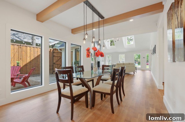Bright and open concept living room with vaulted ceilings