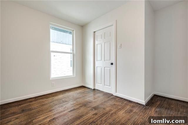 Freshly painted walls and new flooring throughout