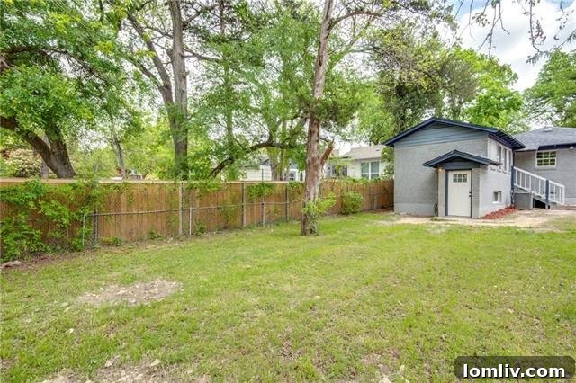 Cedar Oaks Home From Choppy To Chic A Renovation Triumph 30 Exterior view of the back of the house and yard