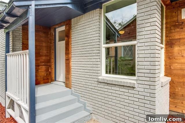 Cedar Oaks Home From Choppy To Chic A Renovation Triumph 6 Inviting front entrance of renovated Oak Cliff house