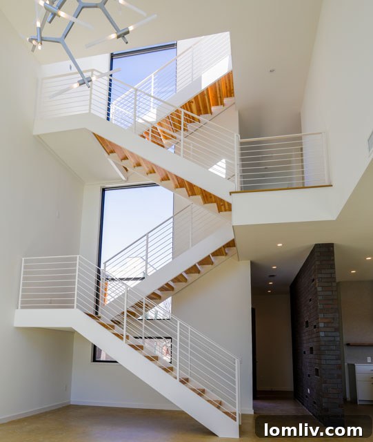 Master bedroom with elegant design and access to a private balcony