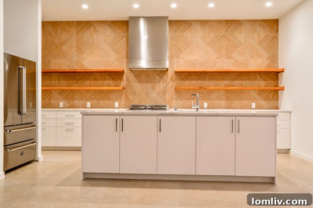 Dining area adjacent to large windows opening to a private backyard