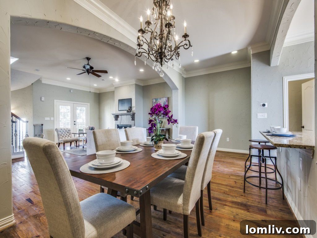 Spacious Dining Area Adjoining an Elegant Kitchen in Dallas Villa
