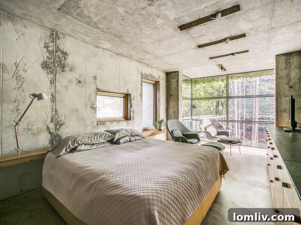 Outdoor patio and refreshing pool area, meticulously designed for relaxation and entertaining amidst lush, private greenery.