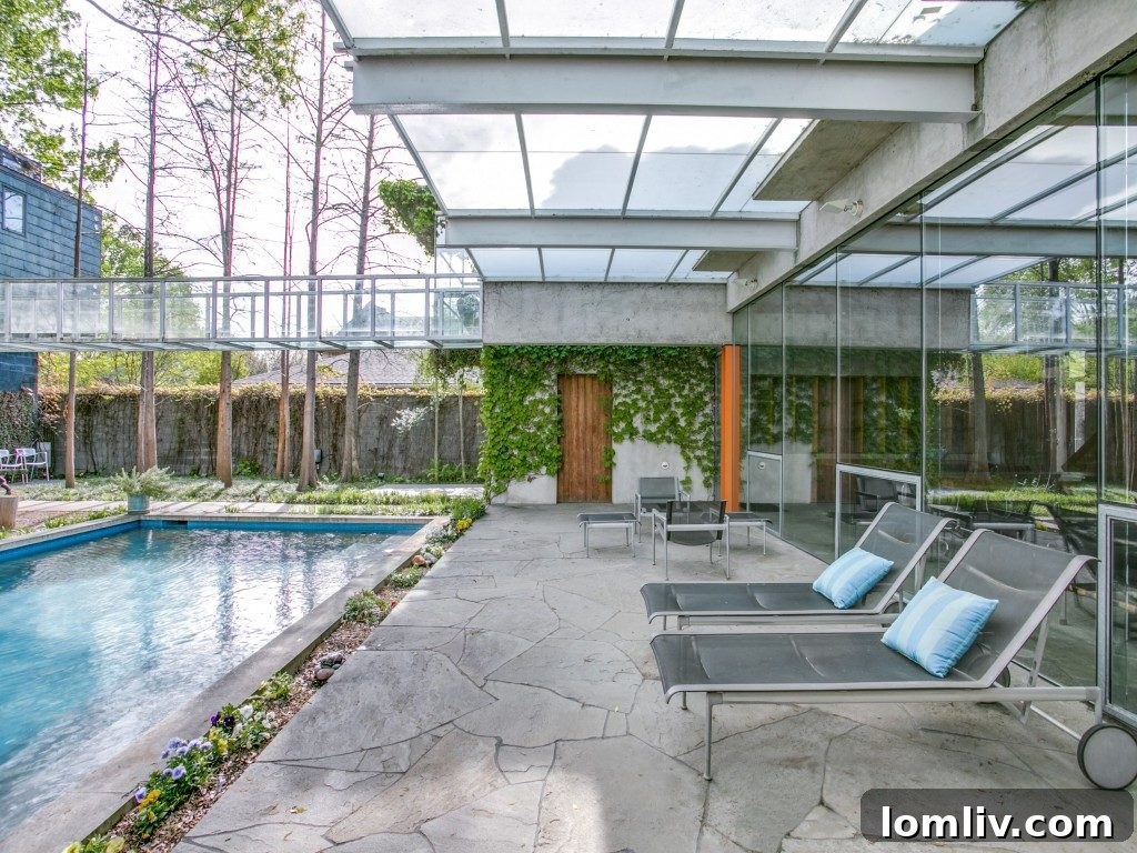 Another perspective of the contemporary interior, highlighting expansive windows and the seamless flow of living spaces.