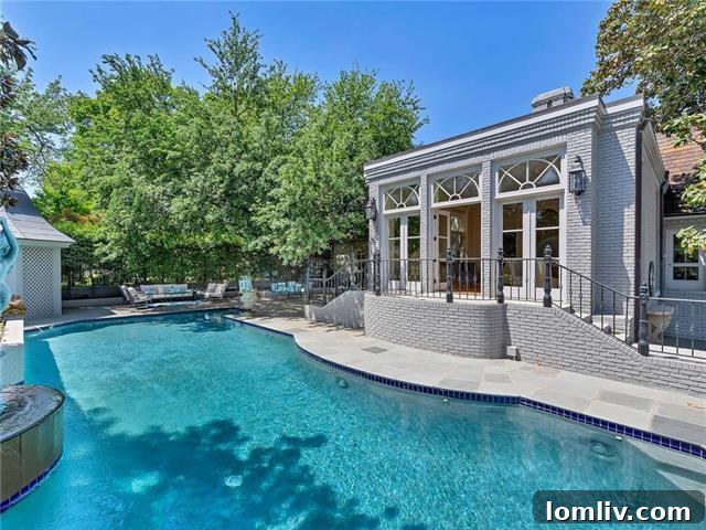 Alta Drive's Subtle Exterior Hides Lavish Grandeur 14 Classical Terrace Room with Pilasters, Arches, and Pool Views