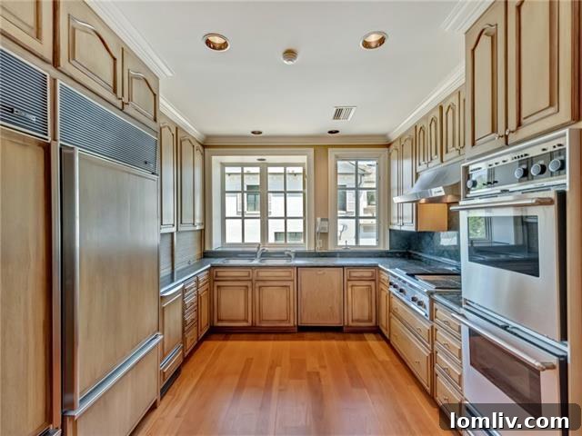 Alta Drive's Subtle Exterior Hides Lavish Grandeur 7 High-End Kitchen with Custom Cabinets and Dual Sub-Zero Refrigerators