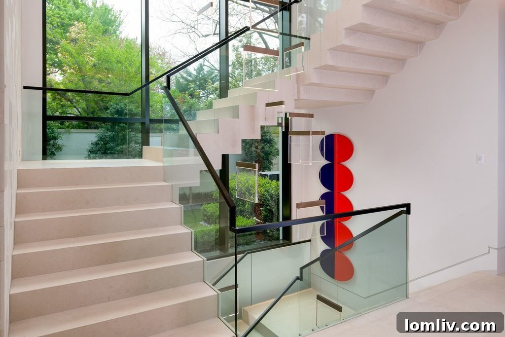 Modern Entryway with Glass Staircase