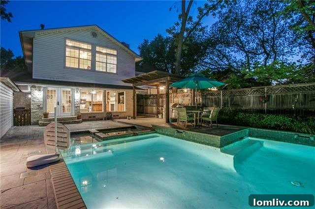 Charming street view of Wilshire Heights neighborhood in East Dallas, showcasing a classic Tudor home