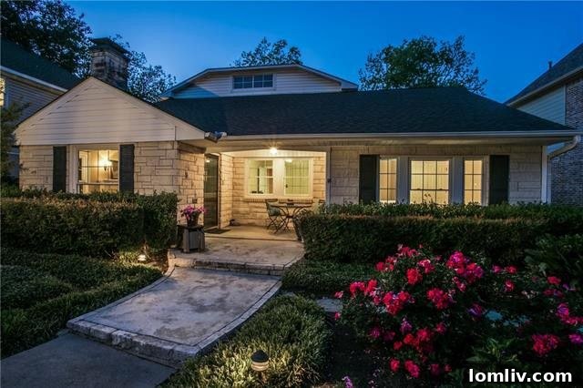Elegant two-story Tudor home with lush landscaping and exceptional curb appeal in Wilshire Heights