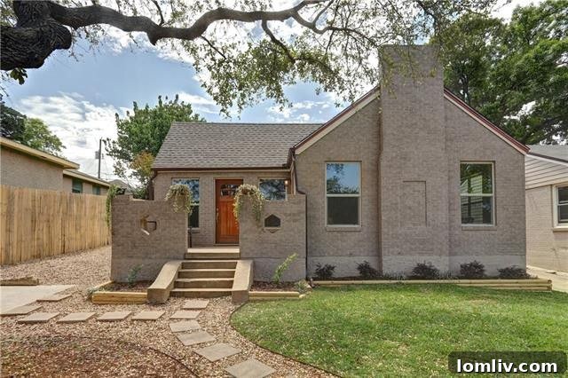Experience the timeless allure of this beautifully renovated 1929 Irwindell cottage in Oak Cliff, featuring a blend of historic charm and modern luxury.