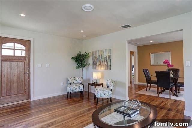 Detailed shot of the renovated bathroom's vanity, featuring contemporary sink and faucet.