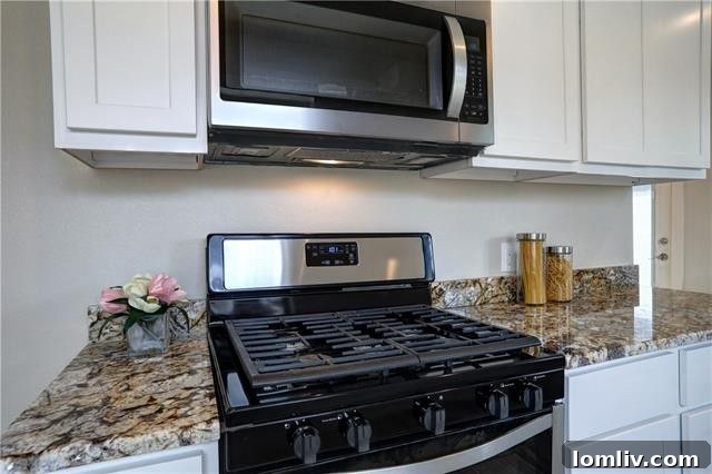 The tranquil tree-lined street view from the elevated lot of 3334 Irwindell Blvd, emphasizing the Dells District's serene environment.