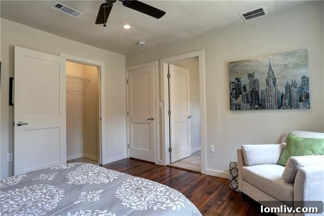 Living room looking towards the dining area, illustrating the open flow and natural light within the cottage.