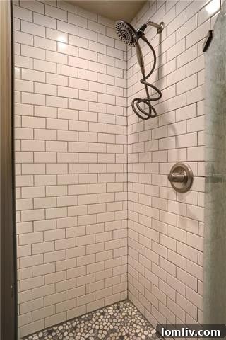 Interior detail shot of a bedroom, emphasizing natural light and the classic hardwood flooring that extends throughout the home.