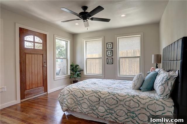 The second bedroom, presented as a versatile space, ideal for guests, a home office, or a personal retreat.