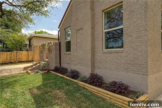 Bright and airy dining room seamlessly connecting the living area to the modernized kitchen, ideal for entertaining.