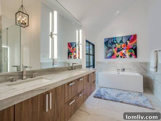 Modern floating dual vanities and mirrors in the luxurious master bath