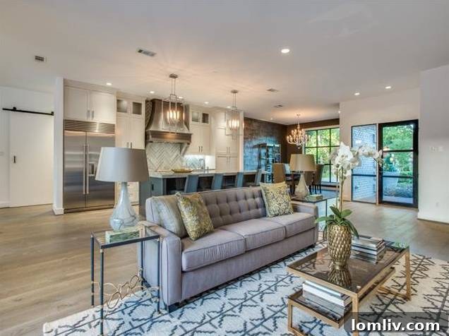 Spacious living room with fireplace and ample natural light at 11705 Parwen