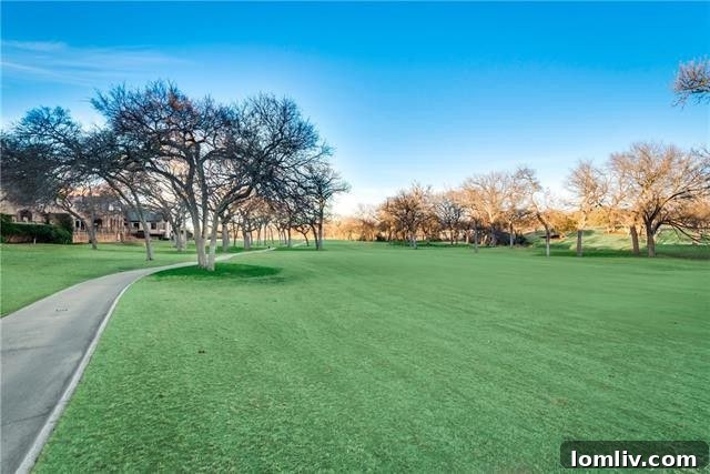 Luxurious master suite bathroom with dual vanities and custom finishes