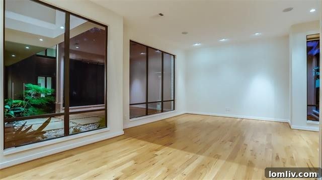 Lush backyard with eco-friendly artificial turf, perfect for entertaining