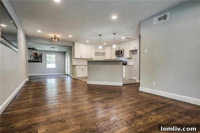 Kitchen Island with Seating and Stainless Steel Appliances