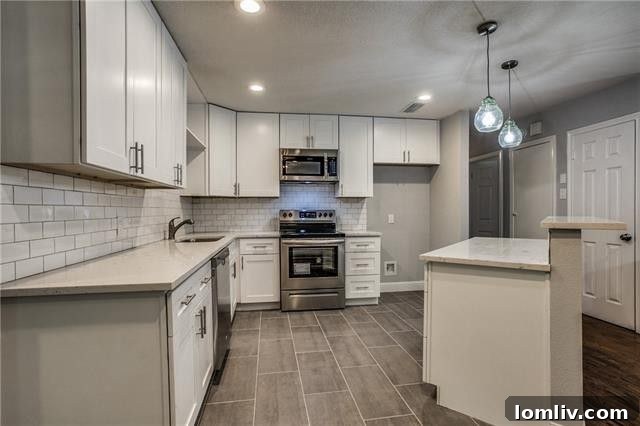 Elegant White Subway Tile Backsplash and Gas Range