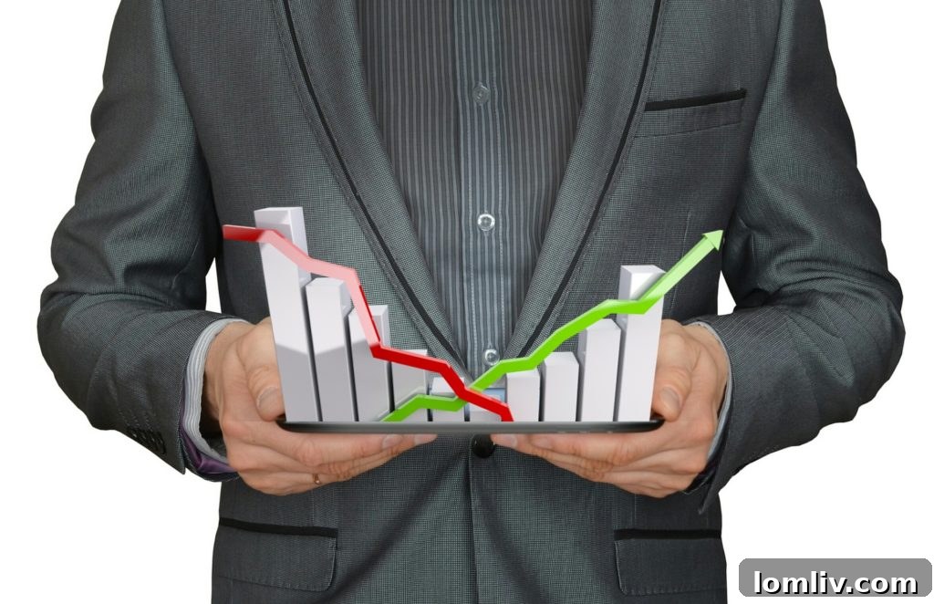 Financial graphic showing a downturn with a hand holding coins, symbolizing economic pressure points.