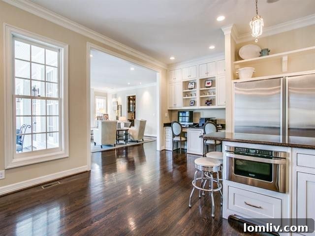 Close-up of the elegant kitchen island and cabinetry in the renovated home