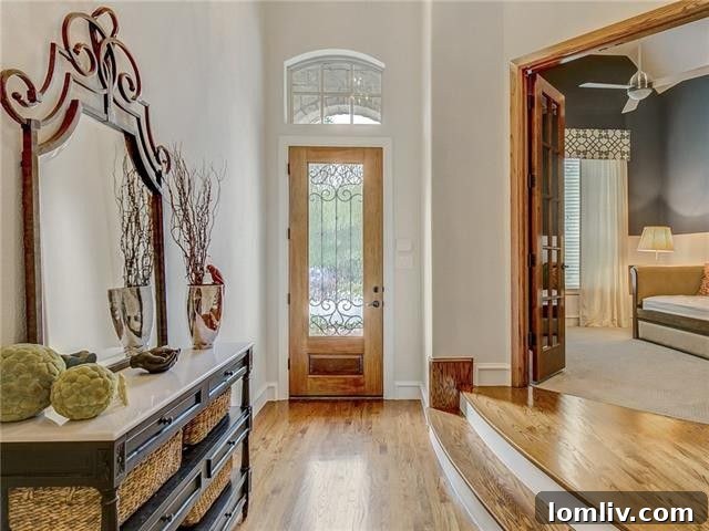 Luxurious master bathroom with a freestanding farm-style tub and high-end fixtures.