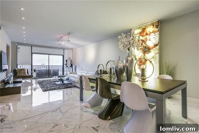 Open-concept living area with balcony in Bonaventure condo