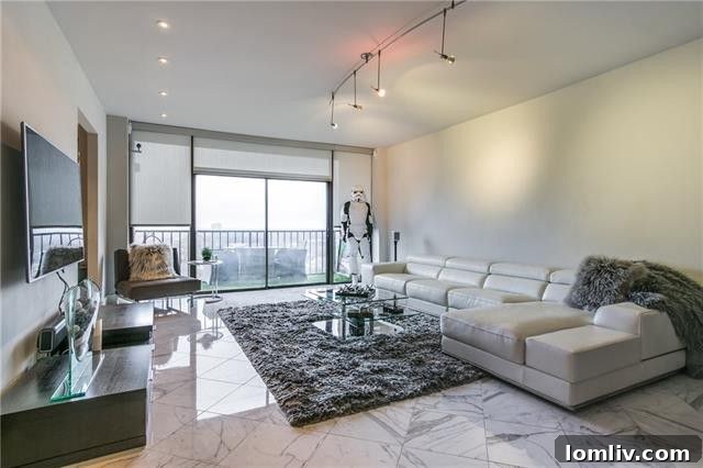 Modern kitchen with stainless steel appliances and granite countertops