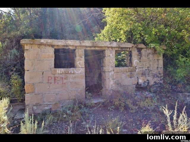 Detail of weathered wood and stone from a historic building in the Utah ghost town