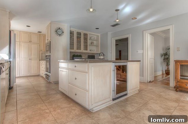 Priced Right and Ready on Windsor Place 7 Formal dining room offering seamless flow from the living area, perfect for entertaining