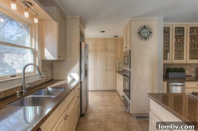 Priced Right and Ready on Windsor Place 8 Large, updated kitchen with modern appliances and central island