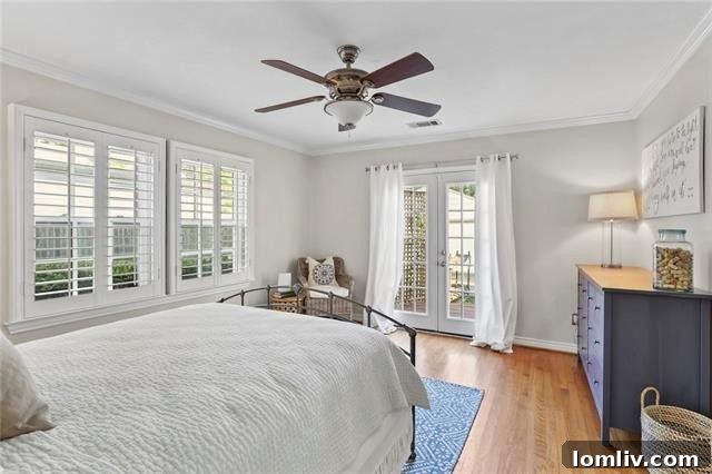 Downstairs Master Bedroom with French Doors to Backyard