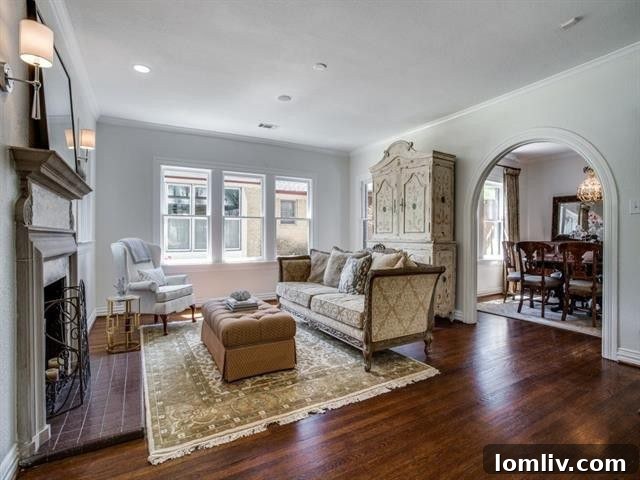 Sun-Drenched Living Room with Classic Fireplace in Dallas Tudor