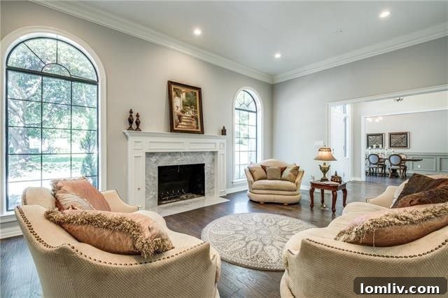 Expansive living area with high ceilings and sophisticated decor