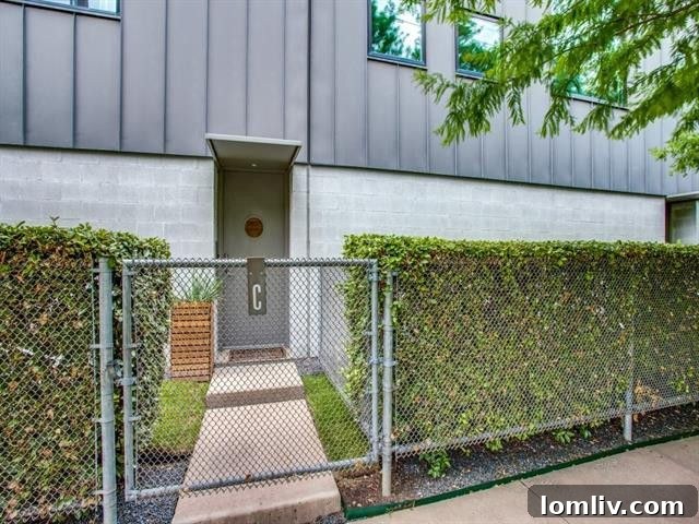 Inside 4001 Bowser Ave. Apt. C, the second-floor living space reveals a beautifully remodeled open-concept design.