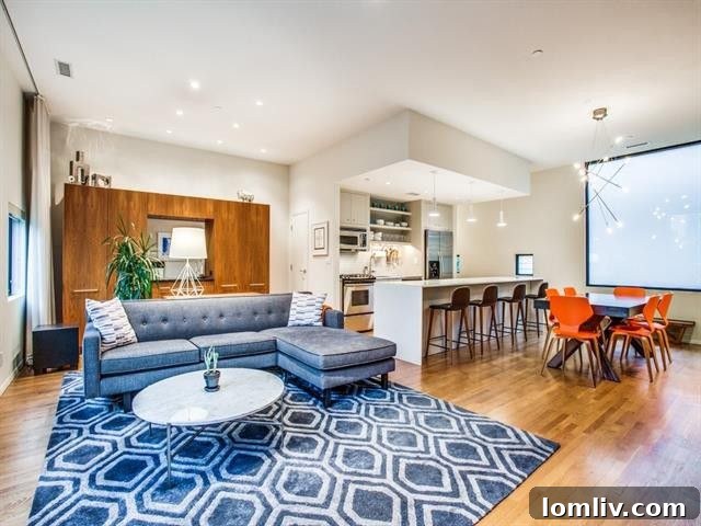 Modern kitchen at 4001 Bowser Ave. with a large island and waterfall countertop.