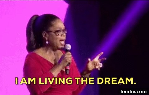 Twilight view of the Madroneagle Estate main house with interior lights glowing warmly.