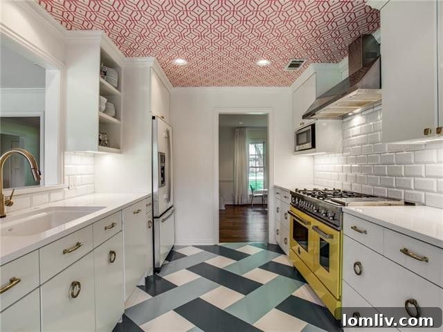 Stunning Kitchen with Yellow Bertazzoni Range in Designer Ranch
